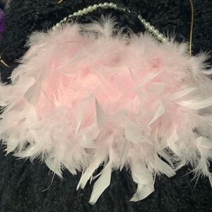 Pink Ross body feather bag